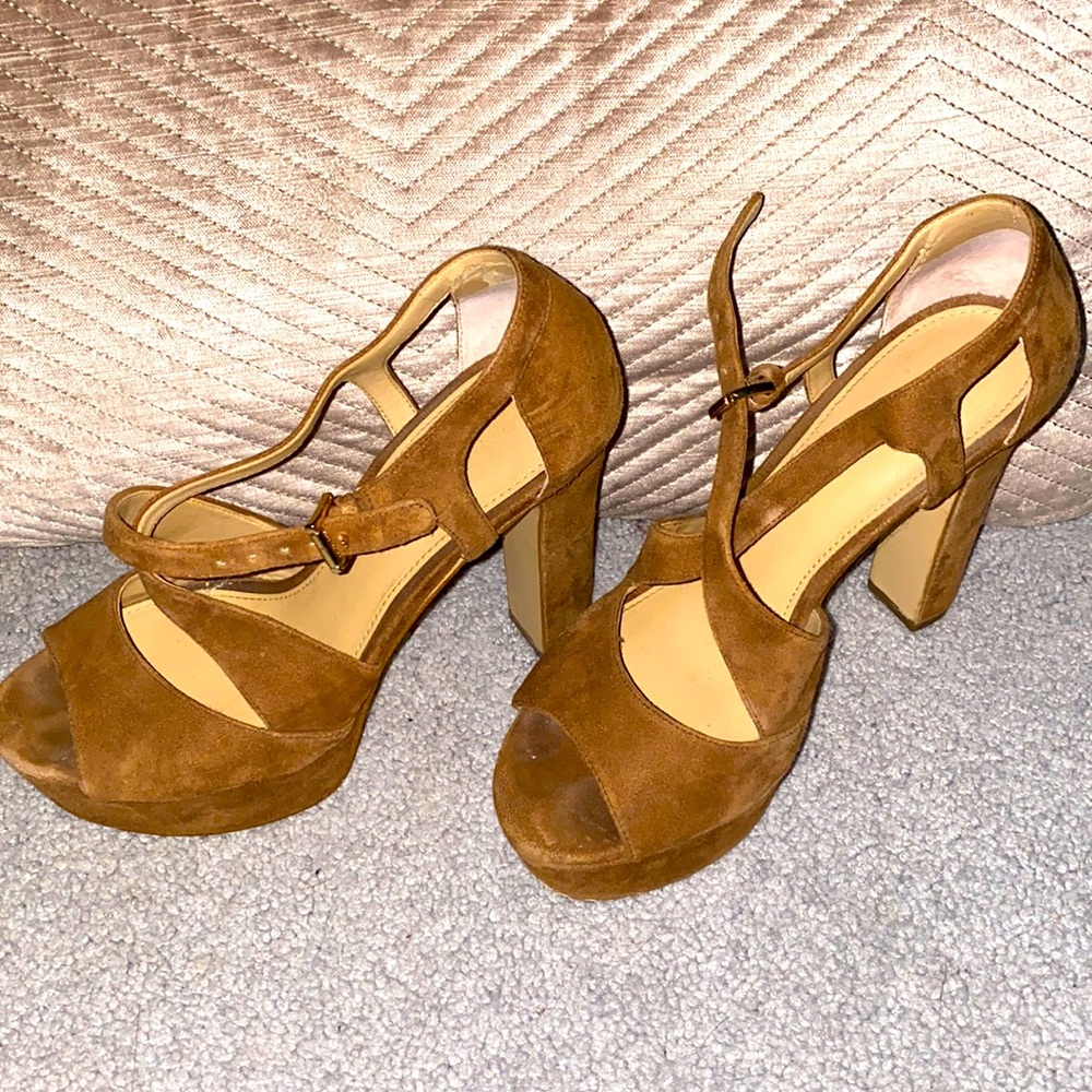 Michael Kors heels. Worn a few times. Have not been worn in years.
